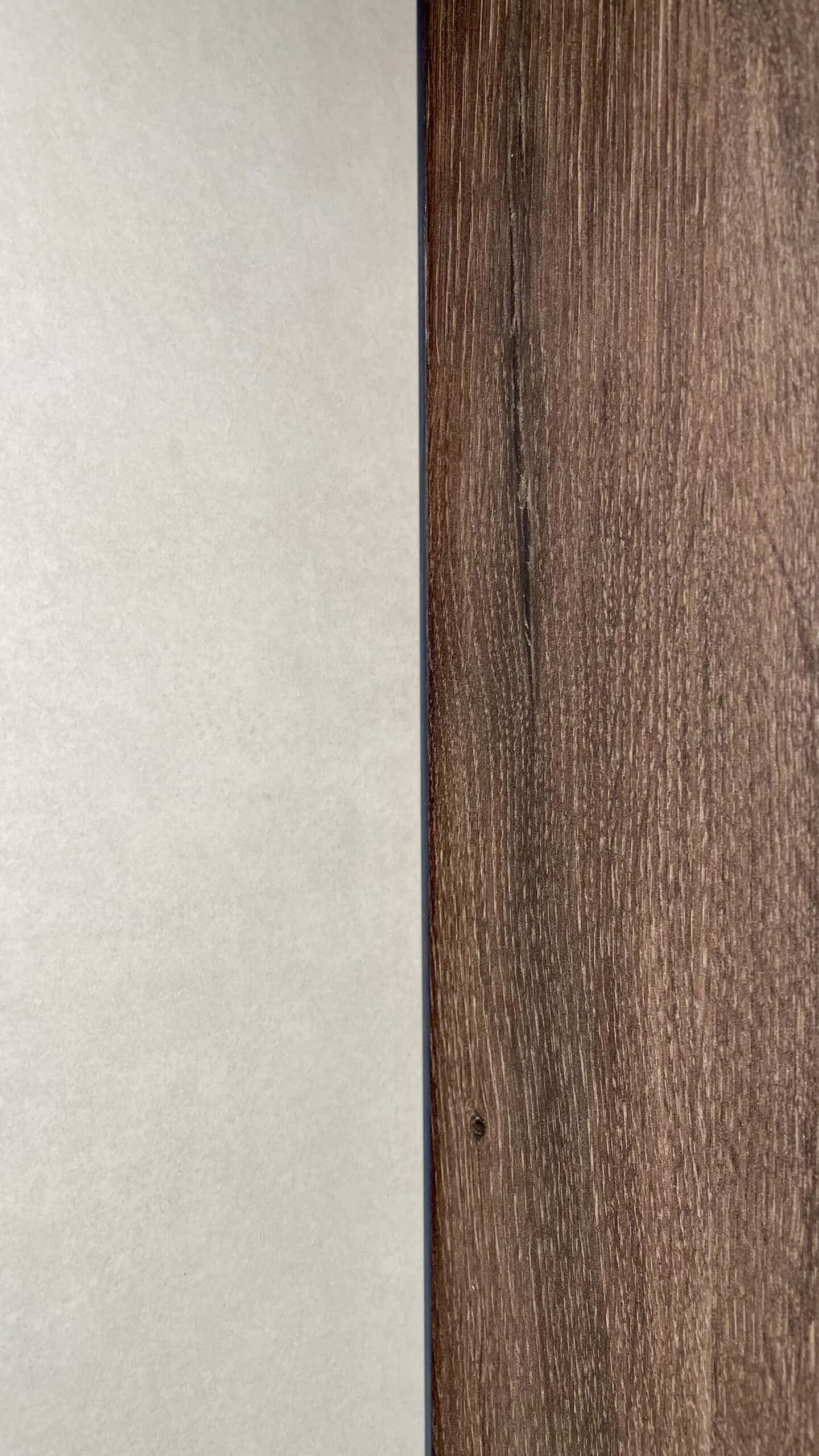Detalle de madera y porcelánico en la reforma