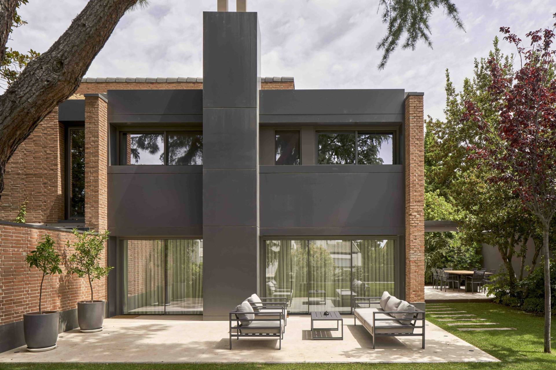 Fachada de vivienda unifamiliar reformada en Zaragoza (CC10)